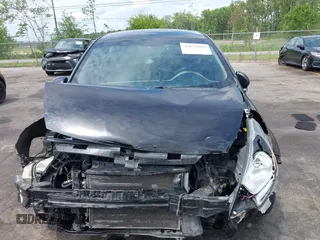 2014 Kia Rio LX with VIN KNADM4A33E6335499, listed as a IAAI auction lot 42123085 with 148,146 mi miles and . Bid and sale history available at DreamBid. Image 12.