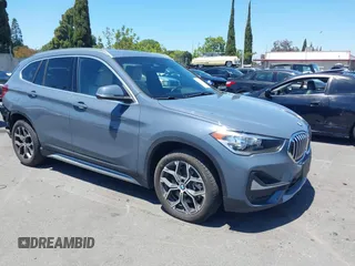 2021 BMW X1 sDrive28i z VIN WBXJG7C02M5T37169, wystawiony jako IAAI lot #42226396 z przebiegiem 48 603 mil mil oraz . Historia ofert i sprzedaży dostępna na DreamBid. Obrazek 1.