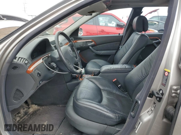 2004 Mercedes-Benz S 430 with VIN WDBNG83J04A430307, listed as a Copart auction lot 52566765 with 169,194 mi miles and Salvage Title. Bid and sale history available at DreamBid. Image 7.