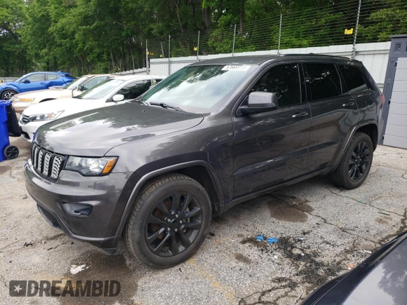 2018 Jeep Grand Cherokee Altitude with VIN 1C4RJEAG0JC208506, listed as a Copart auction lot 52669915 with 159,299 mi miles and Salvage title. Bid and sale history available at DreamBid. Image 1.