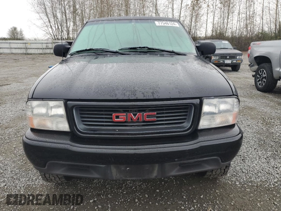1999 GMC Sonoma SLS with VIN 1GTCS19X1X8503254, listed as a Copart auction lot 77546124 with 121,345 mi miles and Clean Title. Bid and sale history available at carsss.com. Image 5.