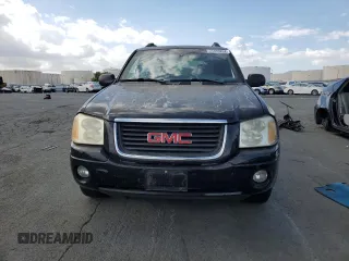 2003 GMC Envoy SLT with VIN 1GKES16SX36220489, listed as a Copart auction lot 71859834 with 148,811 mi miles and Salvage Title. Bid and sale history available at DreamBid. Image 5.