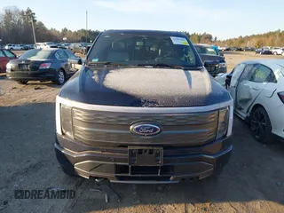 2023 Ford F-150 Lightning Pro with VIN 1FT6W1EV7PWG33511, listed as a IAAI auction lot 41761149 with 10,501 mi miles and . Bid and sale history available at DreamBid. Image 12.