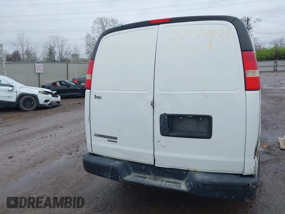 2014 Chevrolet Express Cargo Van with VIN 1GCWGGCA0E1155572, listed as a IAAI auction lot 41965353 with 324,538 mi miles. Bid and sale history available at carsss.com. Image 16.