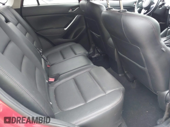 2016 Mazda CX-5 Grand Touring with VIN JM3KE2DY8G0871574, listed as a IAAI auction lot 41959686 with 95,416 mi miles and . Bid and sale history available at DreamBid. Image 8.