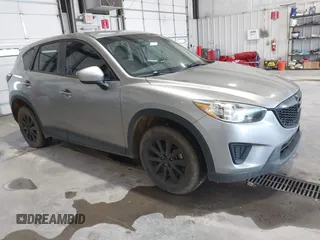 2013 Mazda CX-5 Sport z VIN JM3KE2BE5D0110053, wystawiony jako IAAI lot #42341078 z przebiegiem 231 743 mil mil oraz . Historia ofert i sprzedaży dostępna na DreamBid. Obrazek 1.