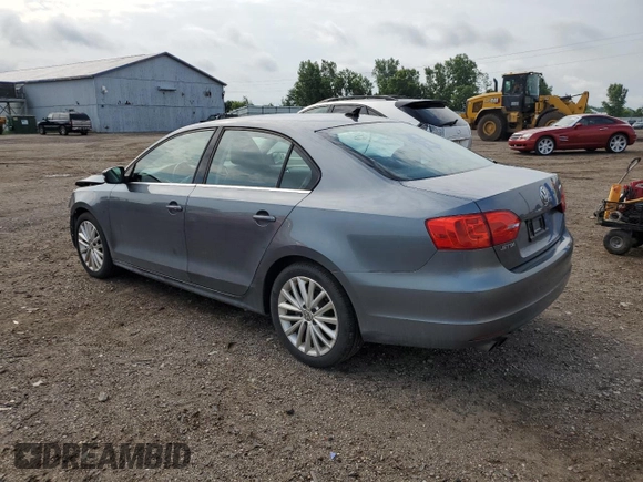 2014 Volkswagen Jetta TDI w/Premium with VIN 3VWLL7AJ6EM428743, listed as a Copart auction lot 63459355 with 145,814 mi miles and Salvage title. Bid and sale history available at DreamBid. Image 2.