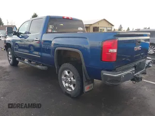 2015 GMC Sierra 2500HD SLT z VIN 1GT12ZE84FF574009, wystawiony jako IAAI lot #41048785 z przebiegiem 167 845 mil mil oraz . Historia ofert i sprzedaży dostępna na DreamBid. Obrazek 3.