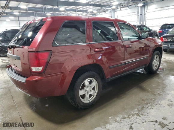 2007 Jeep Grand Cherokee Laredo with VIN 1J8GR48K27C687033, listed as a Copart auction lot 52401165 with 135,146 mi miles and Salvage Title. Bid and sale history available at carsss.com. Image 3.