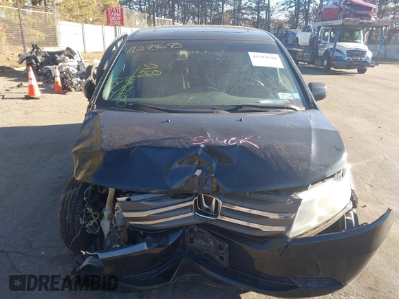 2011 Honda Odyssey EX-L with VIN 5FNRL5H61BB059275, listed as a IAAI auction lot 41293690 with 105,511 mi miles and . Bid and sale history available at carsss.com. Image 12.