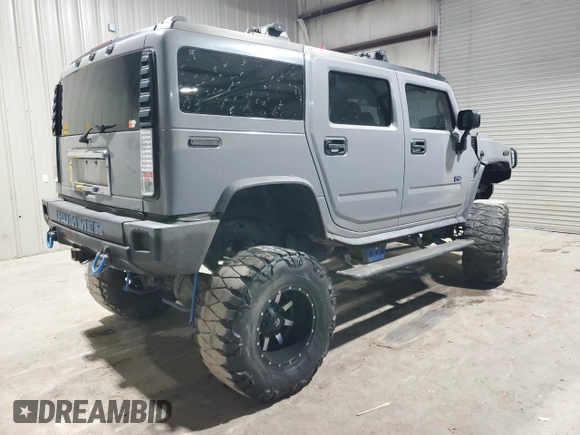 2003 Hummer H2 with VIN 5GRGN23UX3H121083, listed as a Copart auction lot 42355145 with 249,973 mi miles and Clean Title. Bid and sale history available at carsss.com. Image 3.
