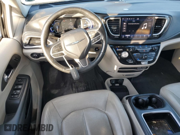2021 Chrysler Pacifica Hybrid Touring L with VIN 2C4RC1L76MR578340, listed as a Copart auction lot 54748445 with 137,390 mi miles and Salvage title. Bid and sale history available at DreamBid. Image 8.