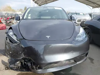 2025 Tesla Model Y Long Range with VIN 7SAYGDED6SF229498, listed as a IAAI auction lot 41086718 with 509 mi miles and . Bid and sale history available at DreamBid. Image 13.