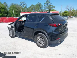 2023 Mazda CX-5 S Preferred with VIN JM3KFBCM7P0188244, listed as a IAAI auction lot 41969630 with 51,058 mi miles and . Bid and sale history available at carsss.com. Image 3.