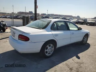 1998 Oldsmobile Intrigue GL z VIN 1G3WS52K2WF325982, wystawiony jako Copart lot #77172634 z przebiegiem 141 276 mil mil oraz Szkody całkowita. Historia ofert i sprzedaży dostępna na DreamBid. Obrazek 3.