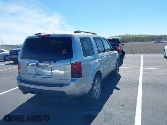 2011 Honda Pilot EX-L with VIN 5FNYF3H6XBB055684, listed as a IAAI auction lot 41820076 with 227,655 mi miles and . Bid and sale history available at DreamBid. Image 4.