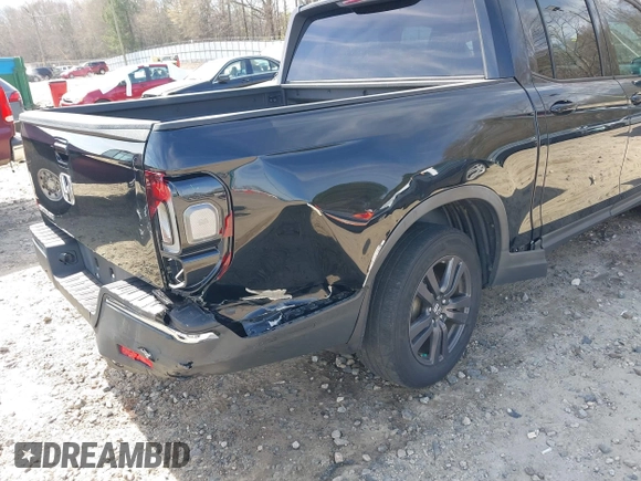 2019 Honda Ridgeline Sport with VIN 5FPYK2F12KB007990, listed as a IAAI auction lot 41828709 with 67,736 mi miles and . Bid and sale history available at DreamBid. Image 6.