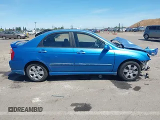 2005 Kia Spectra LX z VIN KNAFE122555192572, wystawiony jako IAAI lot #42266931 z przebiegiem 193 443 mil mil oraz . Historia ofert i sprzedaży dostępna na DreamBid. Obrazek 14.