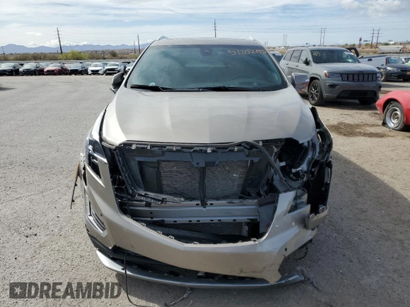 2022 Cadillac XT5 FWD Premium Luxury z VIN 1GYKNCRS9NZ180043, wystawiony jako Copart lot #51352195 z przebiegiem 12 399 mil mil oraz Szkoda całkowita • Salvage title. Historia ofert i sprzedaży dostępna na DreamBid. Obrazek 5.