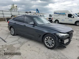 2015 BMW 3 Series 328i Gran Turismo xDrive with VIN WBA3X5C54FD560468, listed as a Copart auction lot 54310135 with 96,522 mi miles and Salvage title. Bid and sale history available at DreamBid. Image 4.