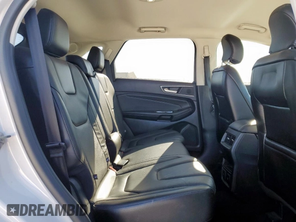 2015 Ford Edge Titanium z VIN 2FMTK3K93FBC38982, wystawiony jako Copart lot #50225465 z przebiegiem 126 110 mil mil oraz Czysty tytuł • Clean title. Historia ofert i sprzedaży dostępna na DreamBid. Obrazek 11.