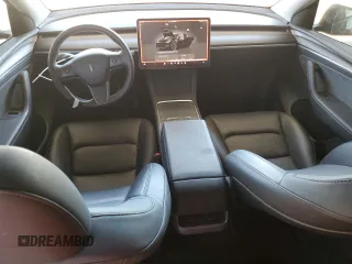 2024 Tesla Model Y Long Range с VIN 7SAYGDEE8RF983280, выставлен на аукционе Copart как лот 55417555 с пробегом 52 273 миль миль и Списание • Salvage title. История ставок и продаж доступна на DreamBid. Изображение 8.