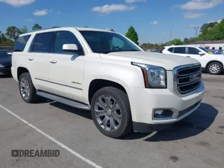 2015 GMC Yukon Denali with VIN 1GKS1CKJ3FR230797, listed as a IAAI auction lot 41977294 with 174,633 mi miles. Bid and sale history available at carsss.com. Image 1.