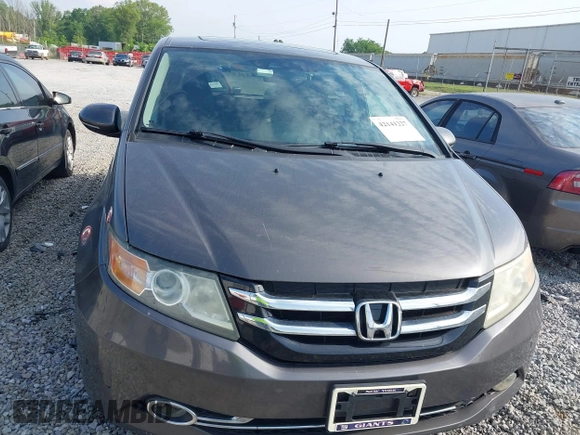 2014 Honda Odyssey Touring with VIN 5FNRL5H99EB111685, listed as a IAAI auction lot 42141227 with 183,484 mi miles and . Bid and sale history available at DreamBid. Image 12.