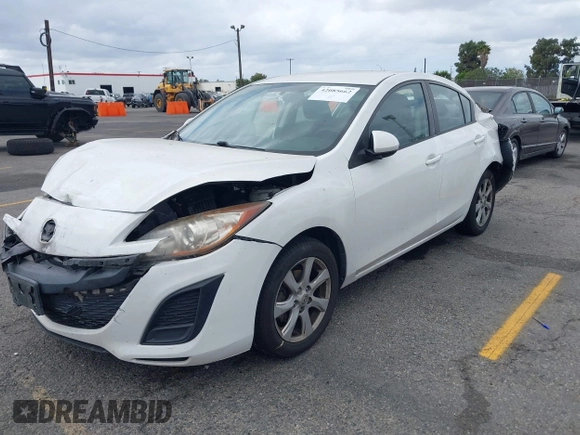 2011 Mazda 3 i Touring with VIN JM1BL1VF1B1402934, listed as a IAAI auction lot 42085662 with 162,473 mi miles and . Bid and sale history available at DreamBid. Image 2.