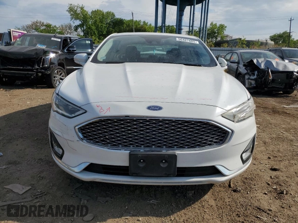 2020 Ford Fusion Titanium with VIN 3FA6P0D96LR173756, listed as a Copart auction lot 56467885 with 77,217 mi miles and Salvage title. Bid and sale history available at DreamBid. Image 5.