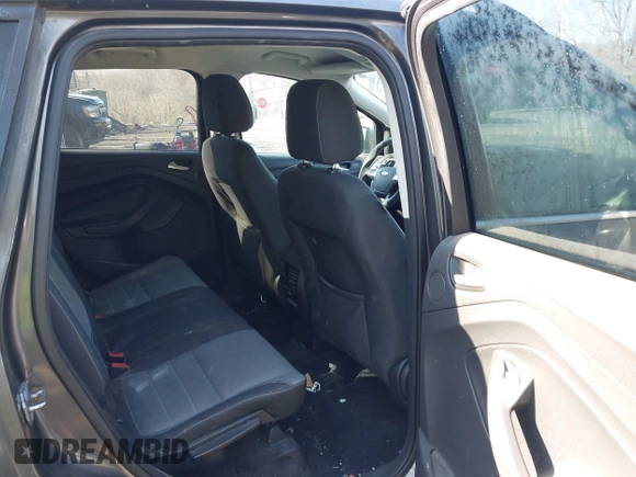 2015 Ford Escape SE with VIN 1FMCU9GX6FUB35649, listed as a IAAI auction lot 42055398 with 128,524 mi miles. Bid and sale history available at carsss.com. Image 8.
