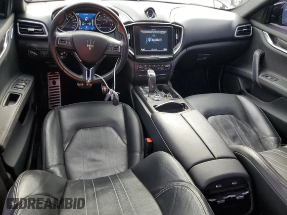 2019 Maserati Ghibli с VIN ZAM57XSA3K1311169, выставлен на аукционе Copart как лот 49583325 с пробегом 66 290 миль миль и Списание • Salvage title. История ставок и продаж доступна на DreamBid. Изображение 8.