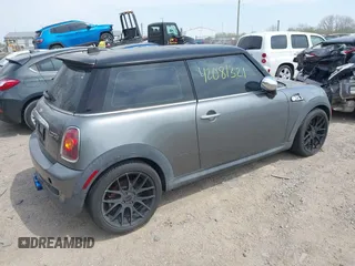 2007 MINI Hardtop S with VIN WMWMF73567TT82315, listed as a IAAI auction lot 42081321 with 123,072 mi miles and . Bid and sale history available at DreamBid. Image 4.