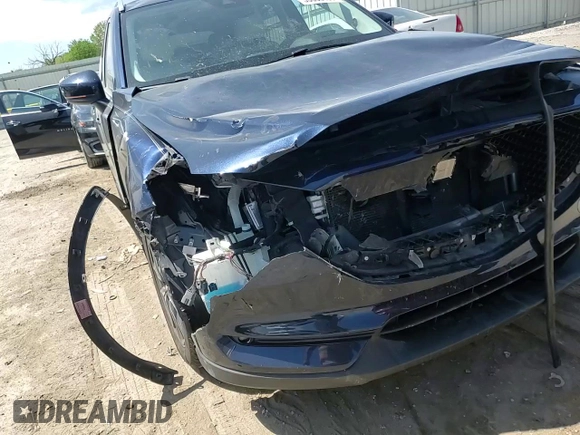 2018 Mazda CX-5 Grand Touring with VIN JM3KFADM7J0377315, listed as a Copart auction lot 53335185 with 68,462 mi miles and Salvage title. Bid and sale history available at DreamBid. Image 12.