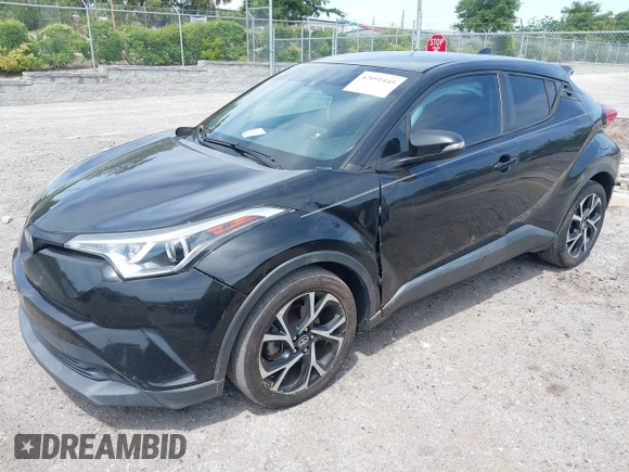 2018 Toyota C-HR XLE with VIN NMTKHMBX0JR008423, listed as a IAAI auction lot 42091445 with 124,811 mi miles. Bid and sale history available at carsss.com. Image 17.