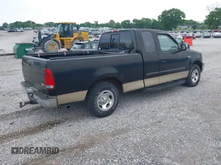 1999 Ford F-150 with VIN 1FTRX17W8XNA81054, listed as a IAAI auction lot 42234408 with Not provided miles and . Bid and sale history available at DreamBid. Image 4.