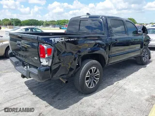 2020 Toyota Tacoma 2WD SR5 with VIN 3TMAZ5CN7LM129496, listed as a IAAI auction lot 39945333 with 140,154 mi miles. Bid and sale history available at carsss.com. Image 4.