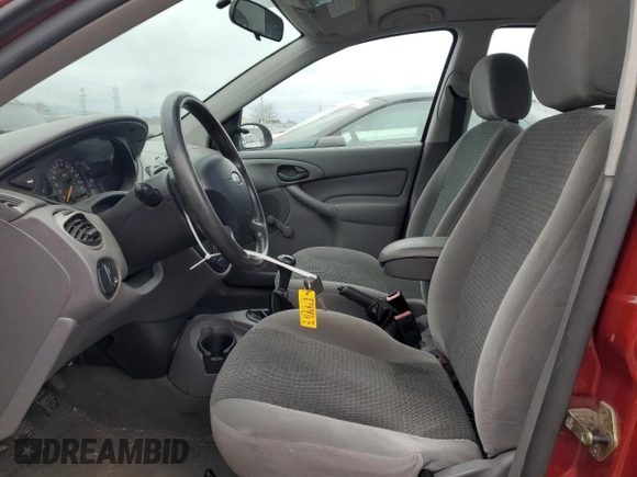 2003 Ford Focus LX with VIN 1FAFP33P13W228550, listed as a Copart auction lot 84184084 with 128,196 mi miles and Non Repairable. Bid and sale history available at DreamBid. Image 7.