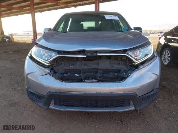 2019 Honda CR-V LX with VIN 2HKRW5H34KH420447, listed as a IAAI auction lot 41616151 with 104,373 mi miles. Bid and sale history available at carsss.com. Image 6.