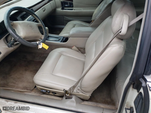 2001 Cadillac Eldorado ESC with VIN 1G6EL12Y41B101007, listed as a Copart auction lot 87553515 with 148,097 mi miles and Salvage Title. Bid and sale history available at carsss.com. Image 7.