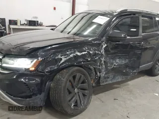2021 Volkswagen Atlas SEL with VIN 1V2BR2CA7MC513764, listed as a IAAI auction lot 41166277 with 67,850 mi miles and . Bid and sale history available at DreamBid. Image 6.