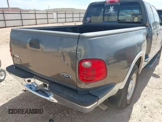2002 Ford F-150 XL with VIN 1FTRX07L92KC81256, listed as a IAAI auction lot 41765831 with 149,506 mi miles. Bid and sale history available at carsss.com. Image 12.