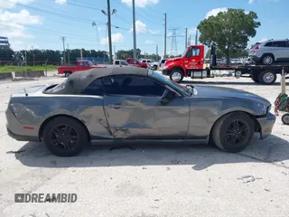 2011 Ford Mustang V6 with VIN 1ZVBP8EM3B5129187, listed as a IAAI auction lot 42555189 with 199,261 mi miles and . Bid and sale history available at DreamBid. Image 13.