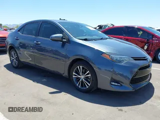 2018 Toyota Corolla L z VIN 2T1BURHE9JC055393, wystawiony jako IAAI lot #42261417 z przebiegiem 146 521 mil mil oraz . Historia ofert i sprzedaży dostępna na DreamBid. Obrazek 1.