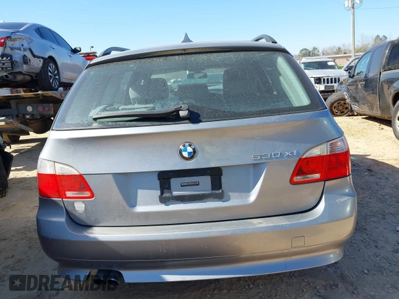 2006 BMW 5 Series 530xi with VIN WBANN73596CN03330, listed as a IAAI auction lot 41649814 with 209,815 mi miles and . Bid and sale history available at carsss.com. Image 16.
