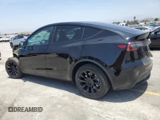2024 Tesla Model Y Long Range with VIN 7SAYGDEEXRA253111, listed as a Copart auction lot 60929295 with 16,423 mi miles and Salvage title. Bid and sale history available at DreamBid. Image 2.