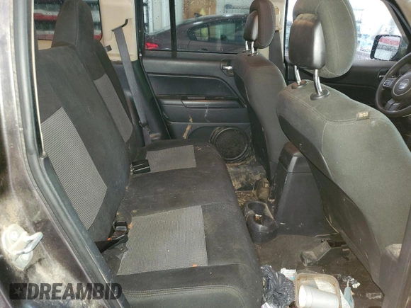 2015 Jeep Patriot Sport with VIN 1C4NJRBB5FD240460, listed as a Copart auction lot 54054755 with 148,502 mi miles and Salvage title. Bid and sale history available at DreamBid. Image 11.