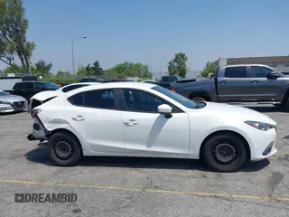 2015 Mazda 3 i Sport z VIN 3MZBM1U72FM168302, wystawiony jako IAAI lot #42331347 z przebiegiem 122 801 mil mil oraz . Historia ofert i sprzedaży dostępna na DreamBid. Obrazek 13.