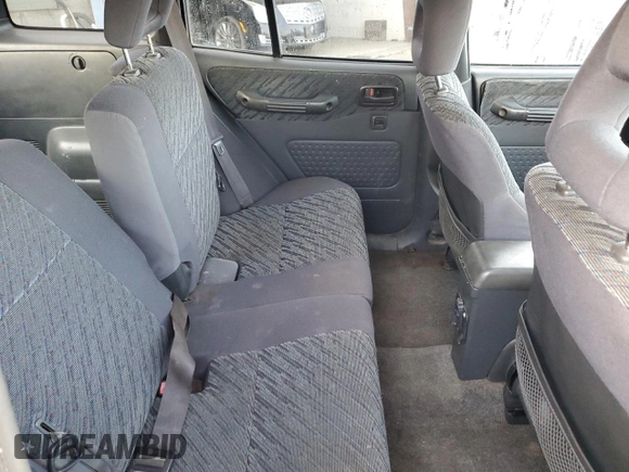 1999 Toyota RAV4 with VIN JT3GP10V9X7042801, listed as a Copart auction lot 82712874 with 256,151 mi miles and Salvage Title. Bid and sale history available at DreamBid. Image 10.