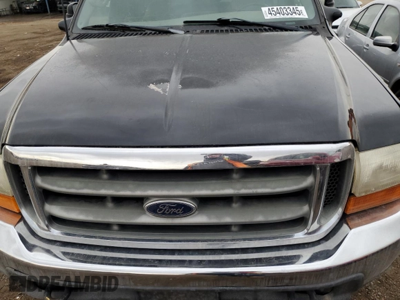 2000 Ford Super Duty F-250 XL with VIN 1FTNW21F6YEC98099, listed as a Copart auction lot 45403345 with 121,425 mi miles and Salvage Title. Bid and sale history available at carsss.com. Image 12.